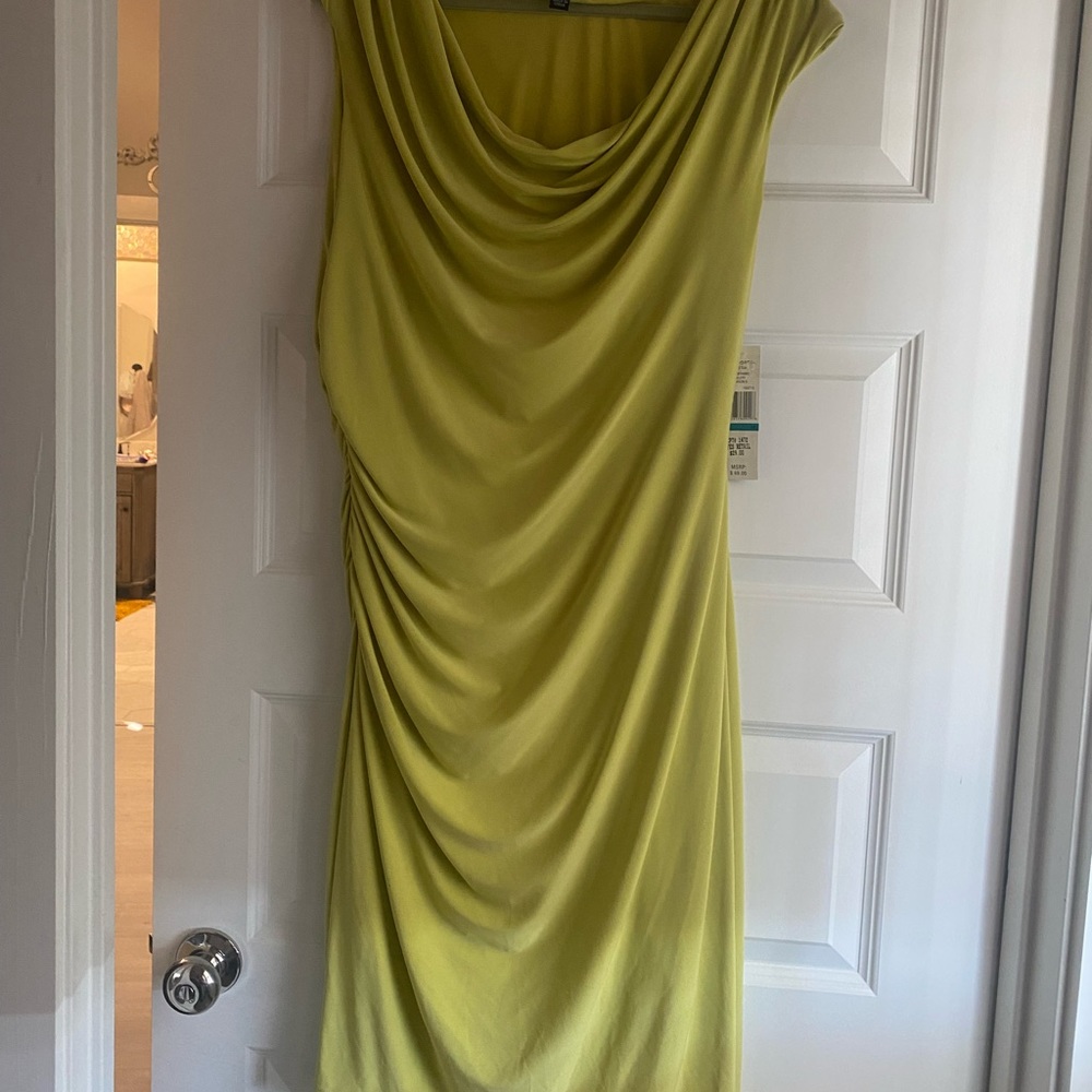 New with tags sleeveless sexy drop neck, knee length dress size 16